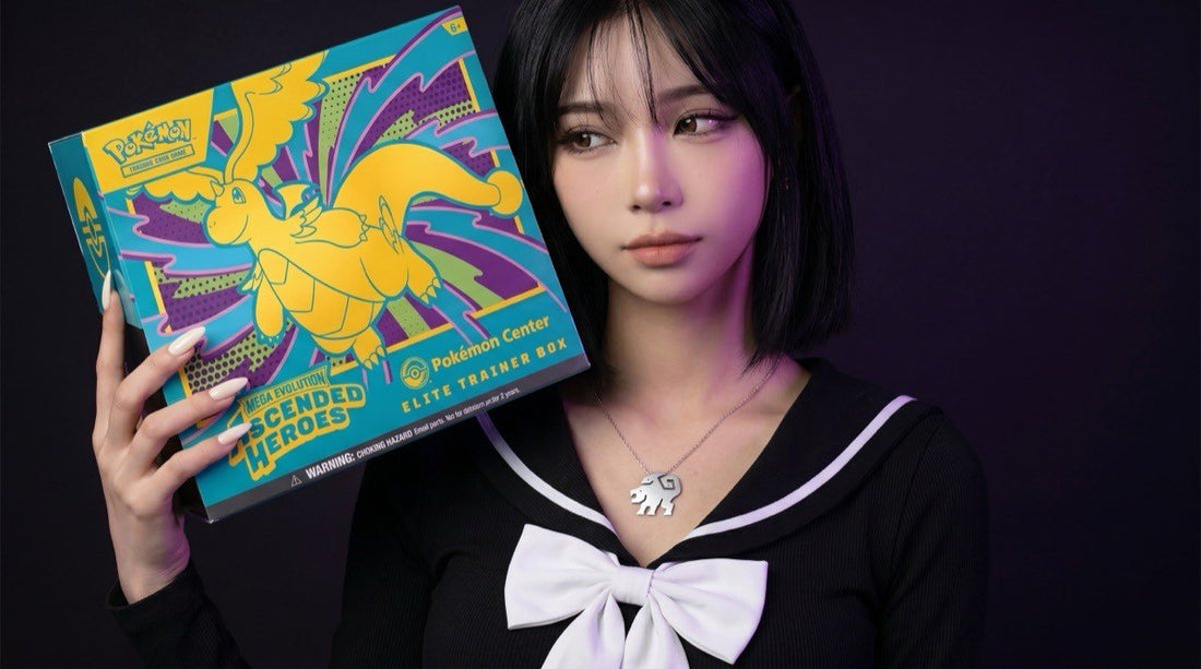 Pokemon Ascended Heroes Pokemon Center Elite Trainer Box presented by the Evol Vault content host in editorial product photography on a dark studio backdrop