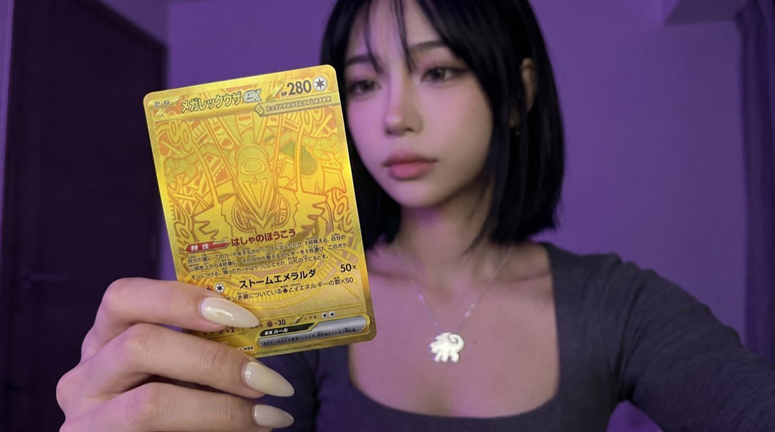 Evol Vault content host Alice holding the gold Mega Rayquaza ex Mega Ultra Rare card from Pokemon Storm Emeralda, the Japanese Delta Reign set