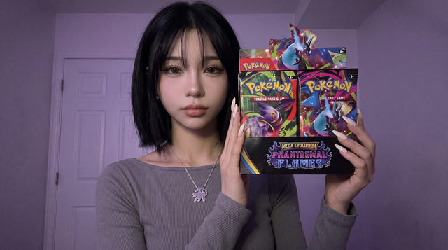 Evol Vault content host Alice holding a Phantasmal Flames booster box display