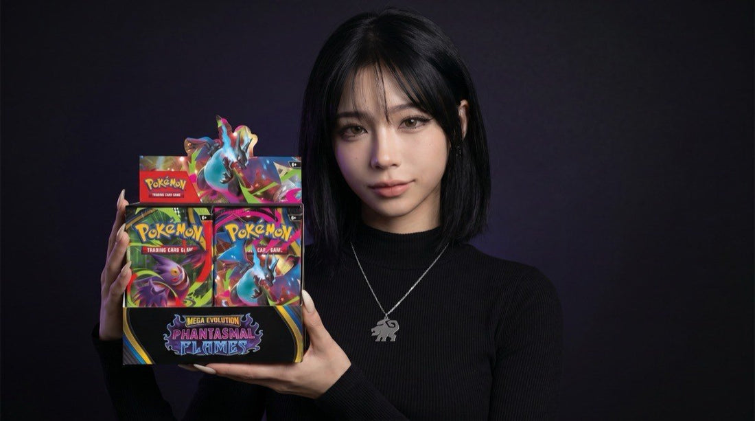 Pokemon Phantasmal Flames Booster Box presented by the Evol Vault content host in editorial product photography on a dark studio backdrop